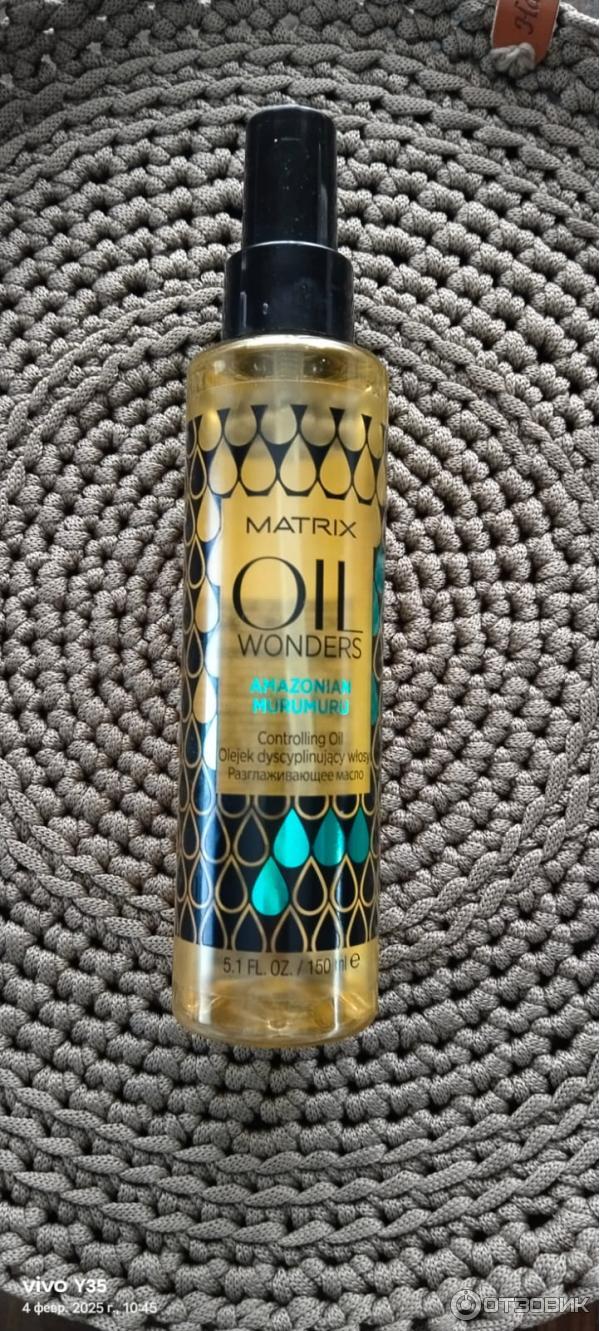 внешний вид флакона Matrix масло для волос разглаживающее