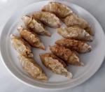 Дамплинги Bibigo "Королевские со свининой и овощами" фото